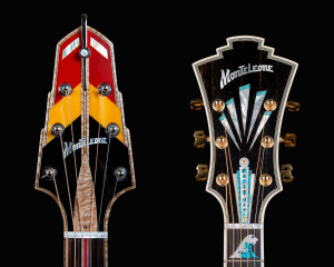 Closeup detail of two ornate guitar headstocks