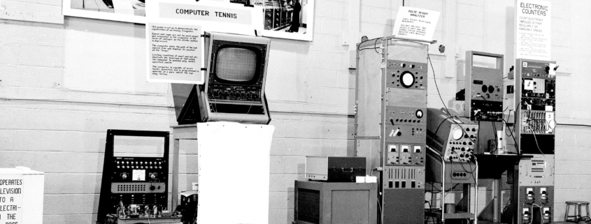 Old photograph of and exhibit at Brookhaven Labs showcasing old computer instruments