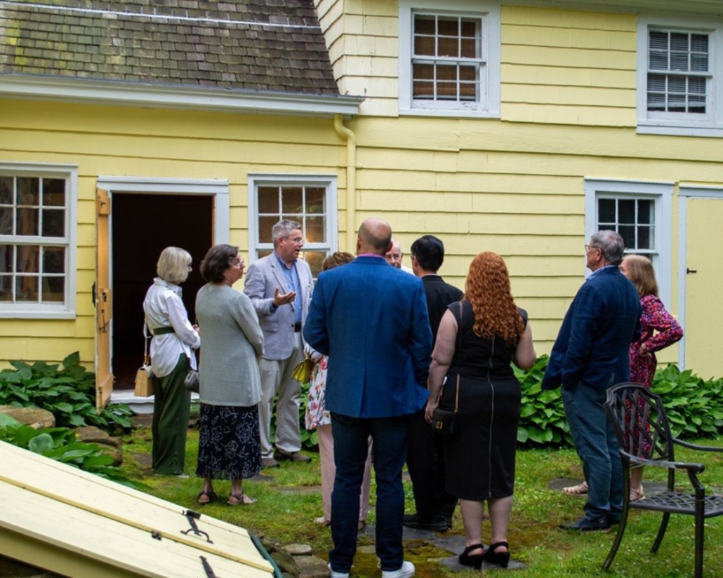 People on a tour of the Hawkins Mount house
