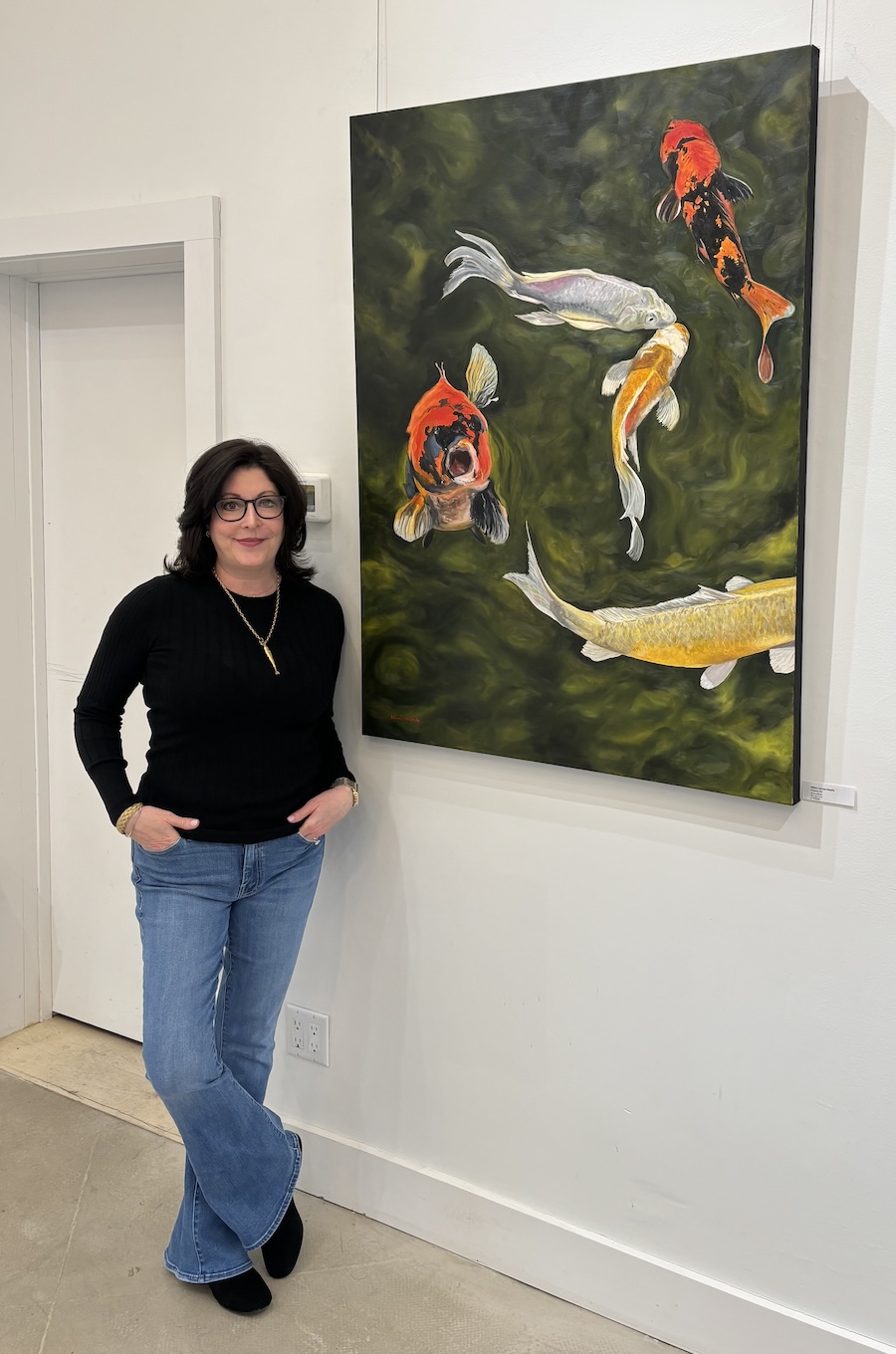 Hillary Serota Needle Artist 2026 Artist Hillary Serota stands by her painting of koi fish